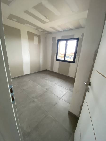 Construction d'une maison plain-pied contemporaine avec une suite parentale, 2 chambres et grande pièce à vivre à SAINT JEAN-DE-FOS proche Montpellier et axe A75