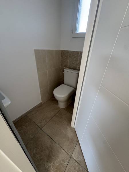 Maison neuve plain-pied avec 2 chambres et garage carrelé à Thézan-lès-Béziers