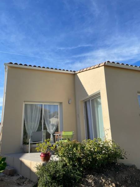 Construction d'une maison avec séjour en L, garage et cellier accolé à CRUZY, situé entre Béziers et Narbonne